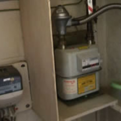 Asbestos Panelling Around Gas Meter.png