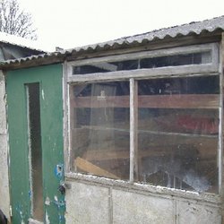 Cement roof and asbestos wall panels